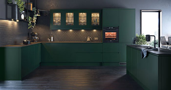 A kitchen with dim lighting